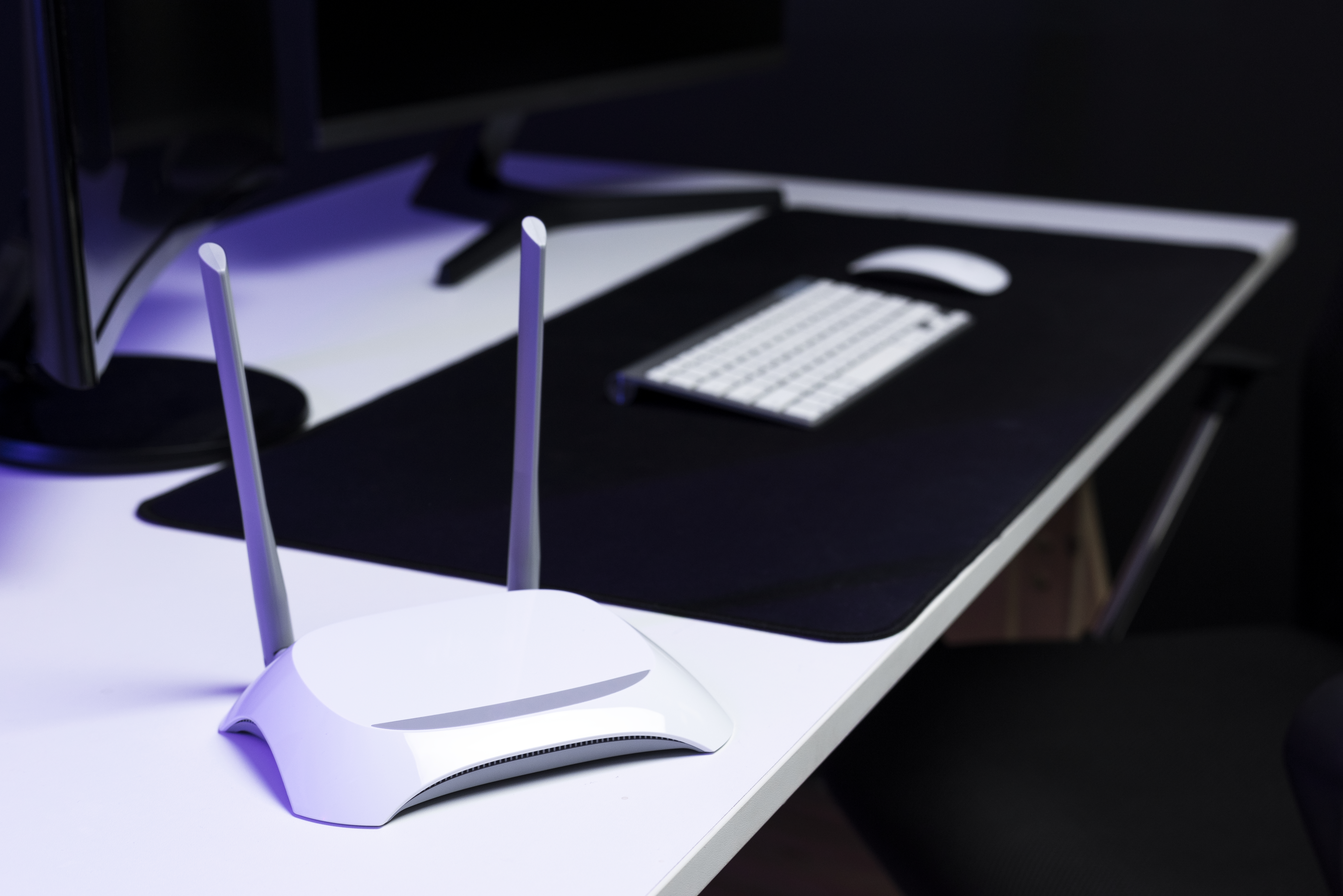 Wifi router on a table smart connection as an illustration for harga extender wifi.